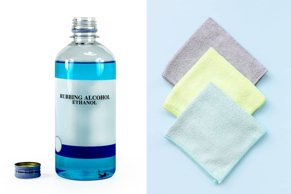 A bottle of rubbing alcohol and a cloth next to it, perfect for removing grass stains from jeans.