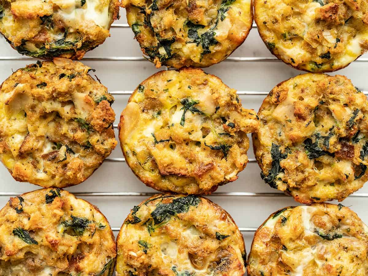 Turkey and spinach muffins on a cooling rack.
