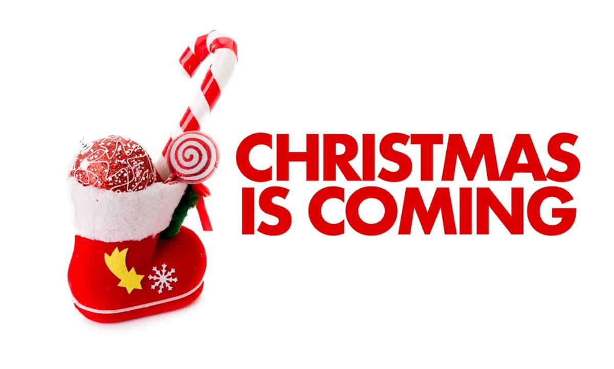 Christmas is coming with a candy cane and a stocking.