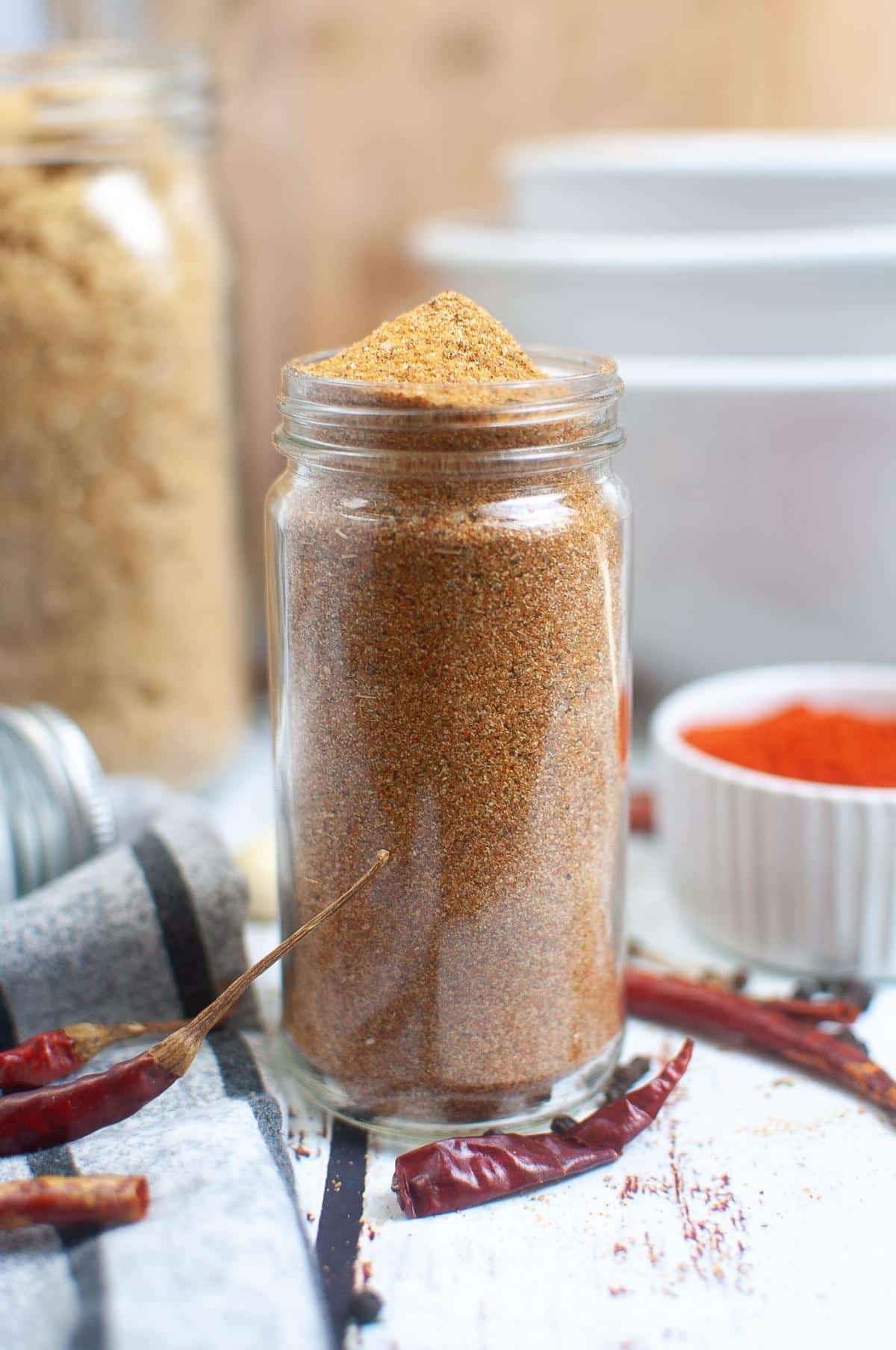 Jar of Dry Rub for Smoking Chicken on table.