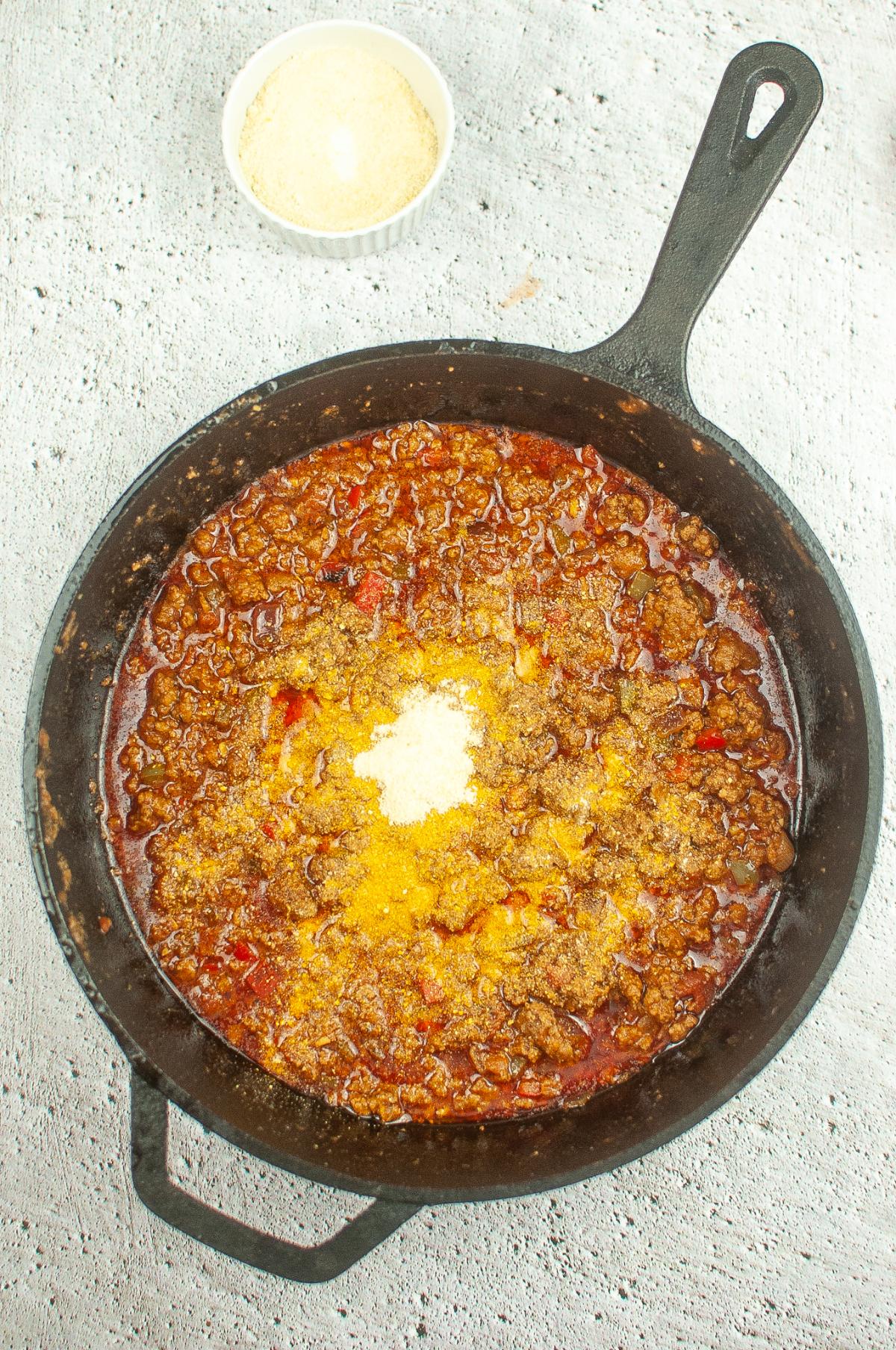 Masa harina is added to the ground beef mixture.