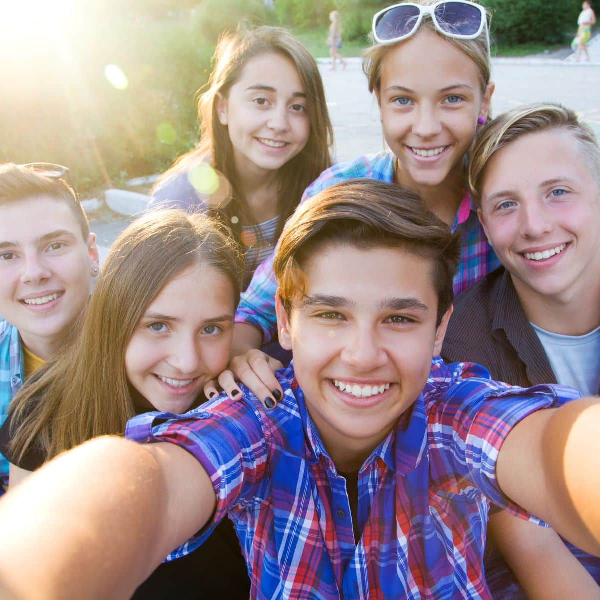 A group of young people capturing a selfie.
