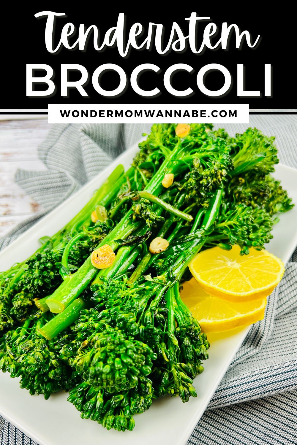 A plate of sautéed Tenderstem Broccoli garnished with lemon slices, with the text "Tenderstem Broccoli" and "wondermomwannabe.com" overlaying the