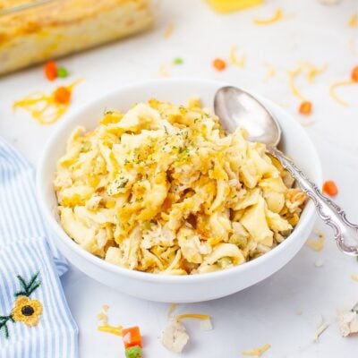A bowl of food with a spoon.