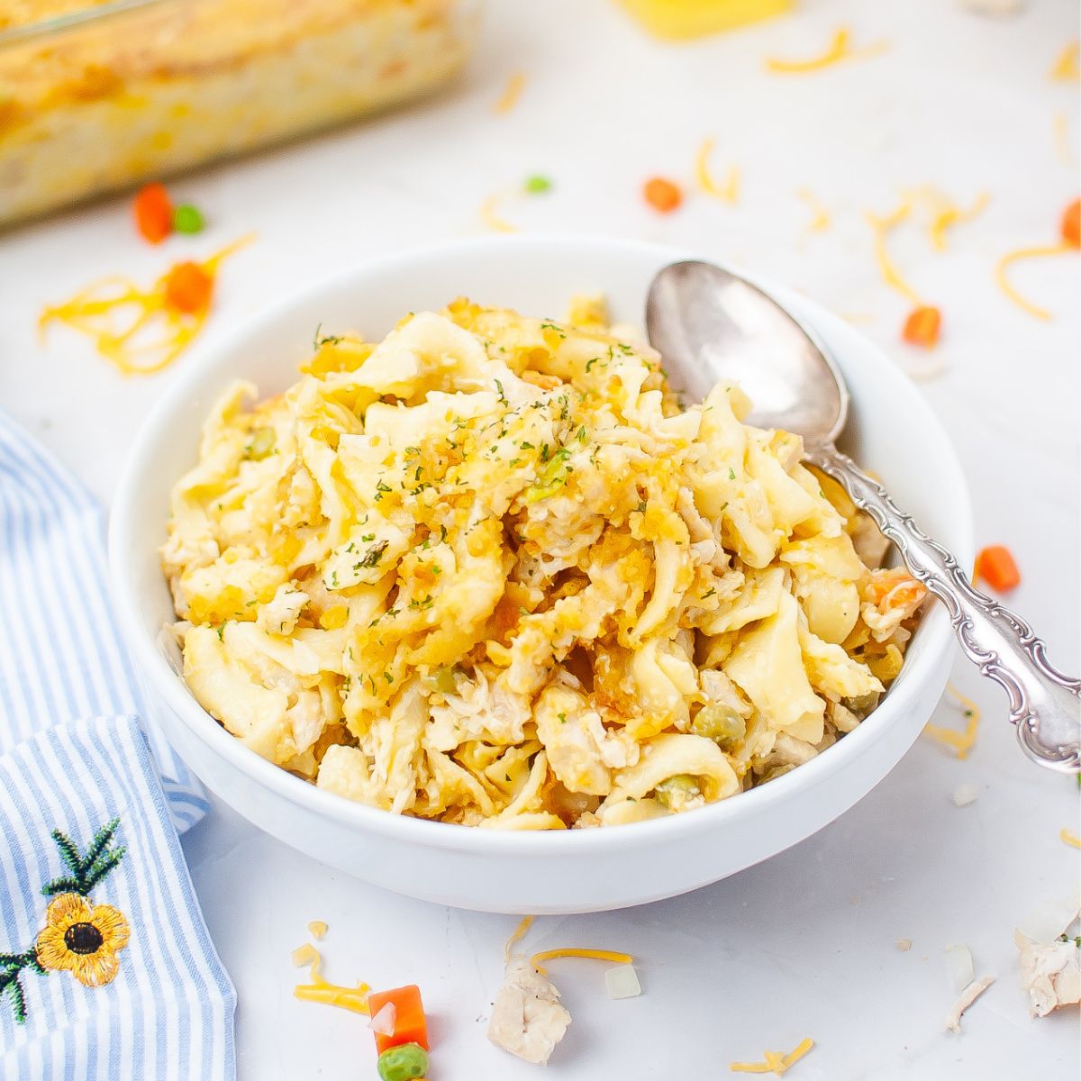 A bowl of food with a spoon.